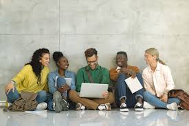 group of students sitting and talking