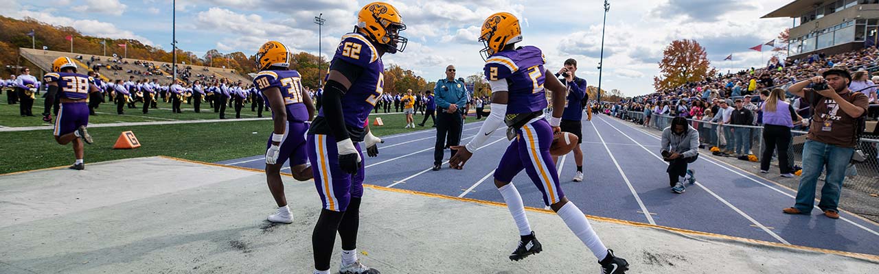 Rams Football Players getting pumped up for a game