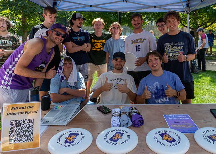 Group fo students at a table during the Involvement fair