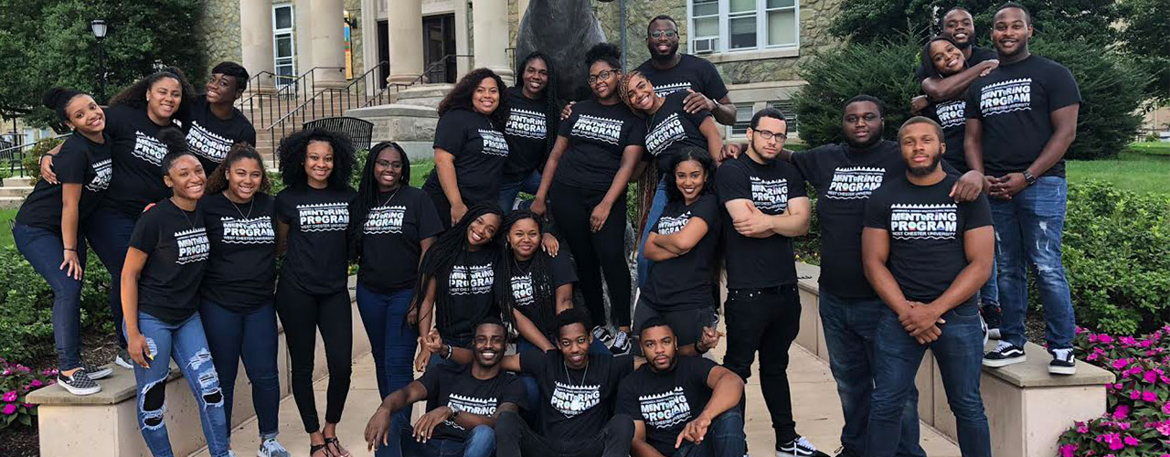 peer mentors on ram statue