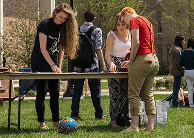 Students at a sign up table