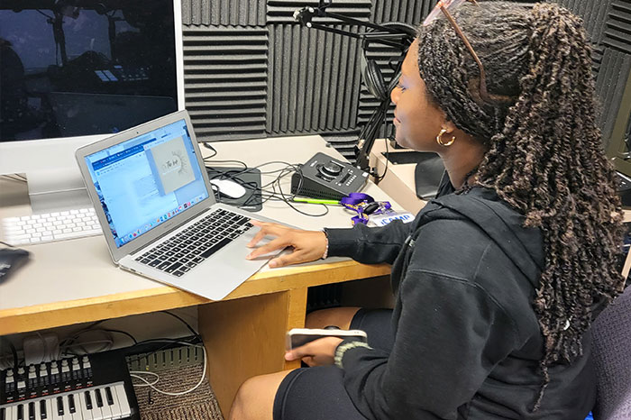 ICamp student wroking in the music studio