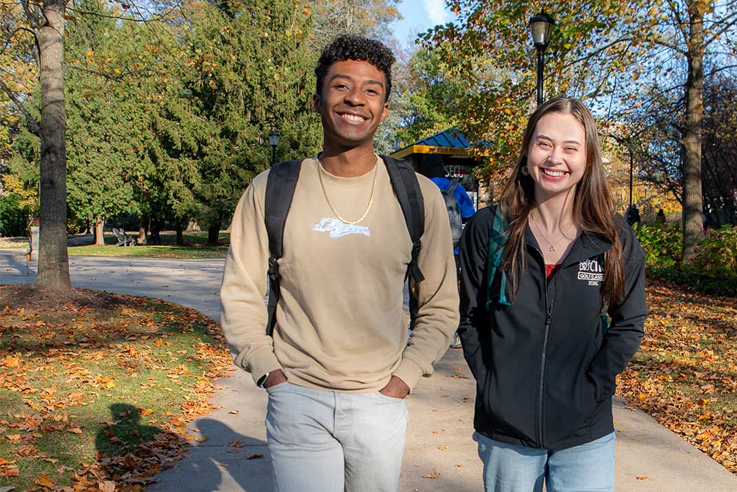 Two Students waling on campus