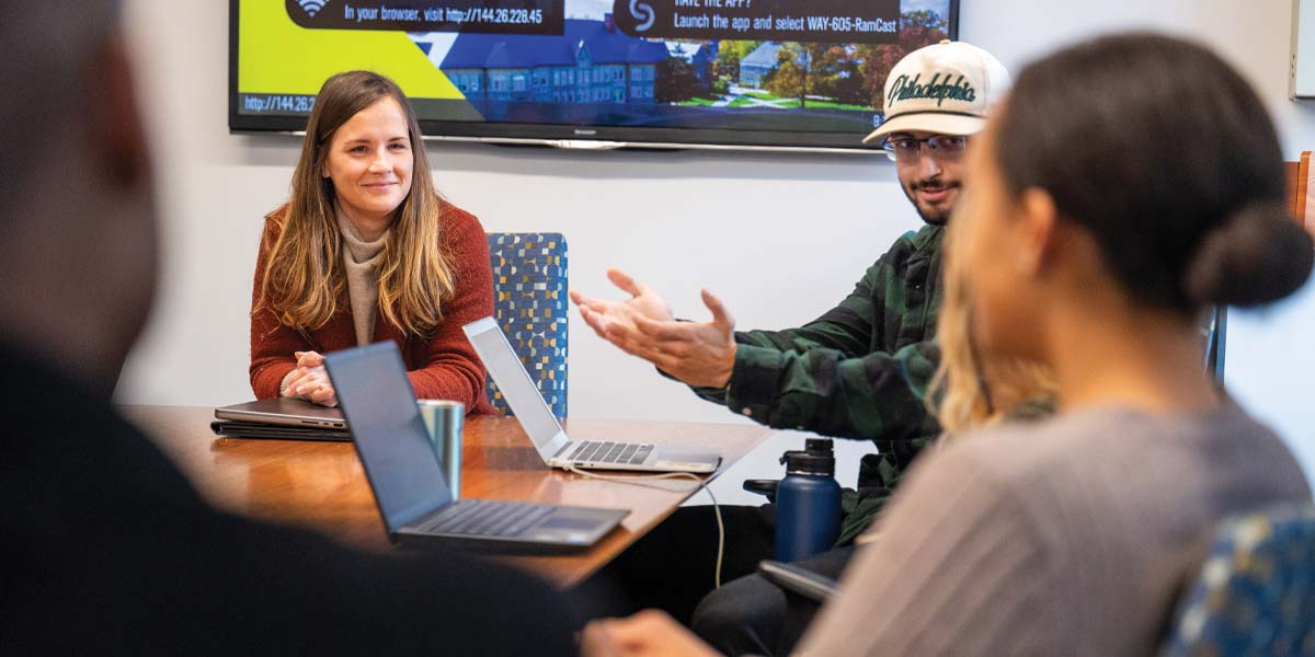 Dr. Stevie Grassetti (left) with her students