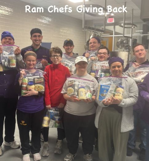 The Ram Chefs are pictured with the meal kits they made from the money raised by selling trail mix.