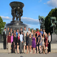 group in front of statue