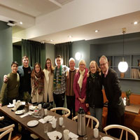 group posing at a table