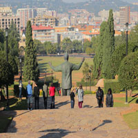 Group posing with their backs to the camera