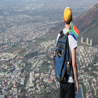 Man with flag in backpack