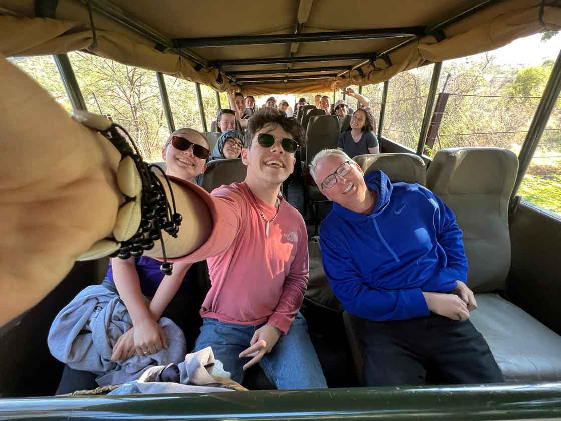 Group selfie in caravan