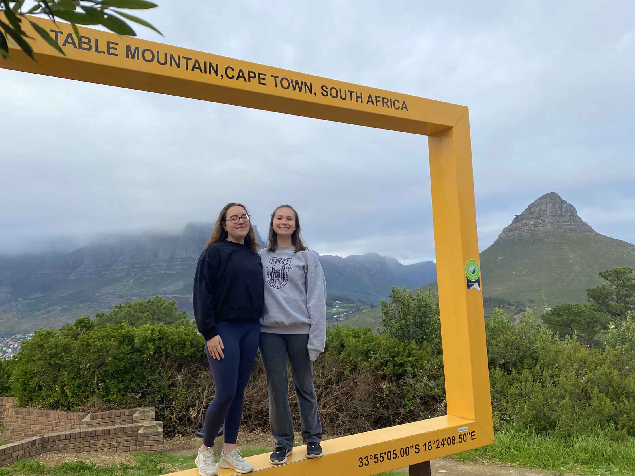 duo posing in the Table Mountain square