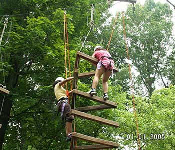 Students on ropes course