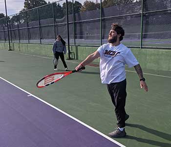 Students playing tennis