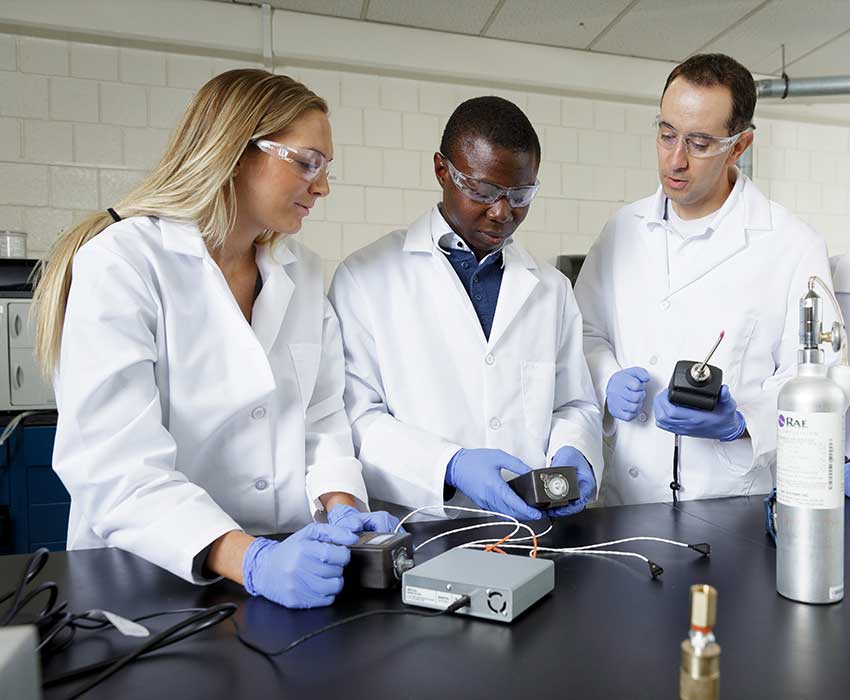 Lab workers discussing