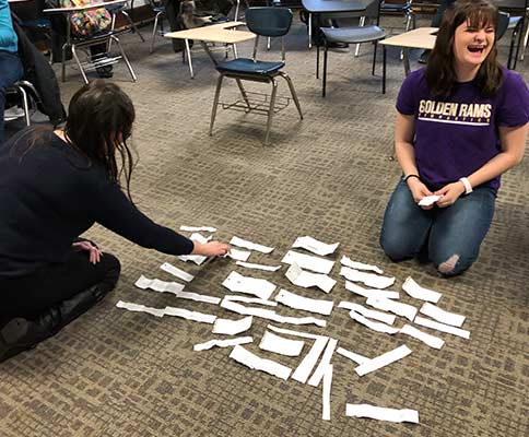 Students constructing exhibit